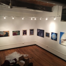 The paintings are hung
